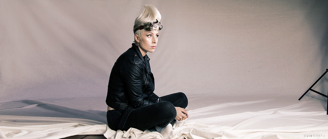 Lix North, award-winning Australian fine artist, painting in her studio